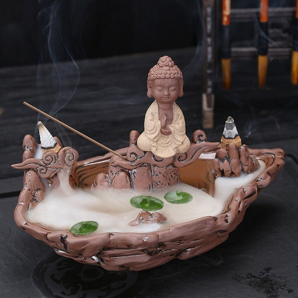 http://www.incense-soul.com/cdn/shop/products/mainimage0Fisherman-Fishing-Buddha-Buddhist-Burner-Backflow-Incense-Burner-With-10Pcs-Cones-Incense-Stick-Censer-Holder-Use.jpg?v=1650479922